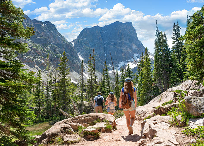 Group of friends hiking in the Rocky Mountains